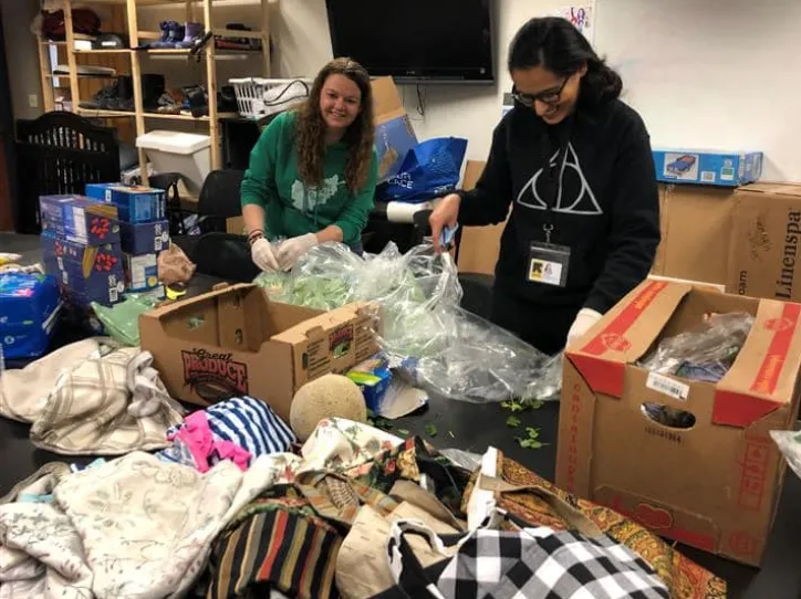 IRC staff organizing donated clothing