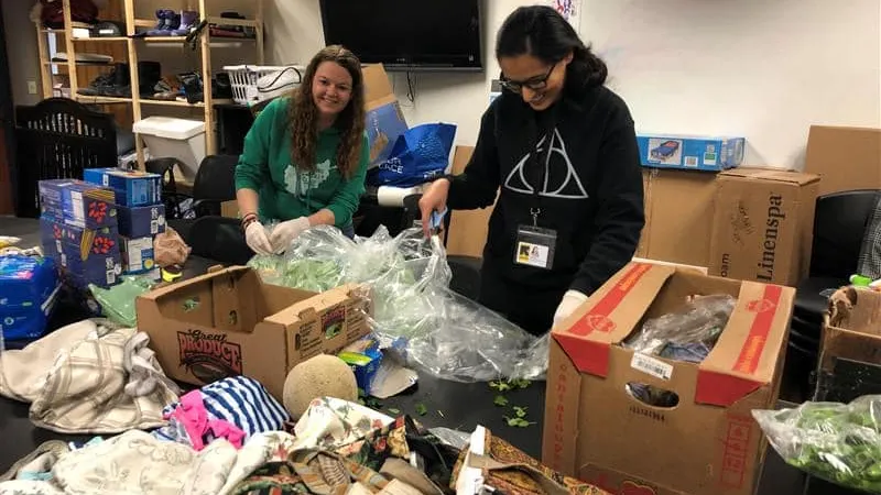 IRC staff organizing donated clothing