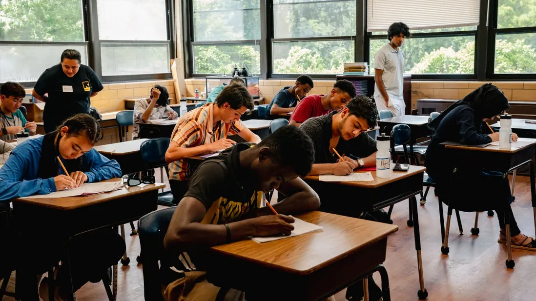 Youth sitting at their desks and learning